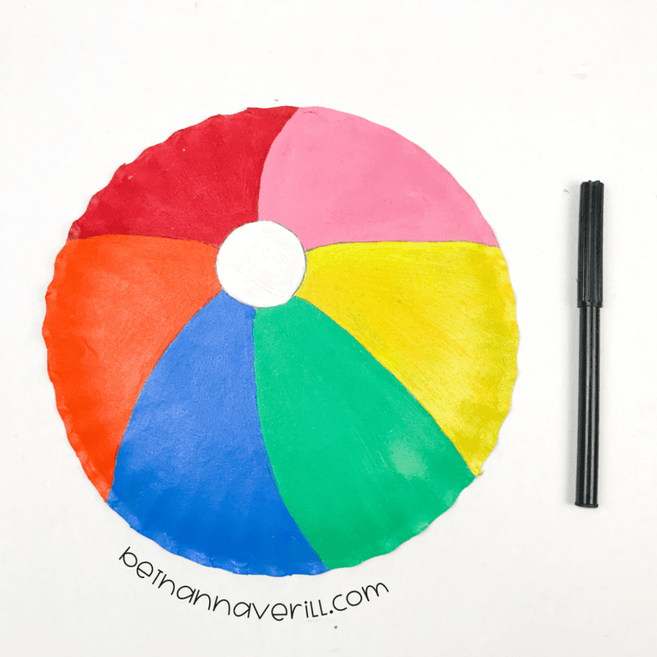 Marker lines traced over the painted beach ball sections