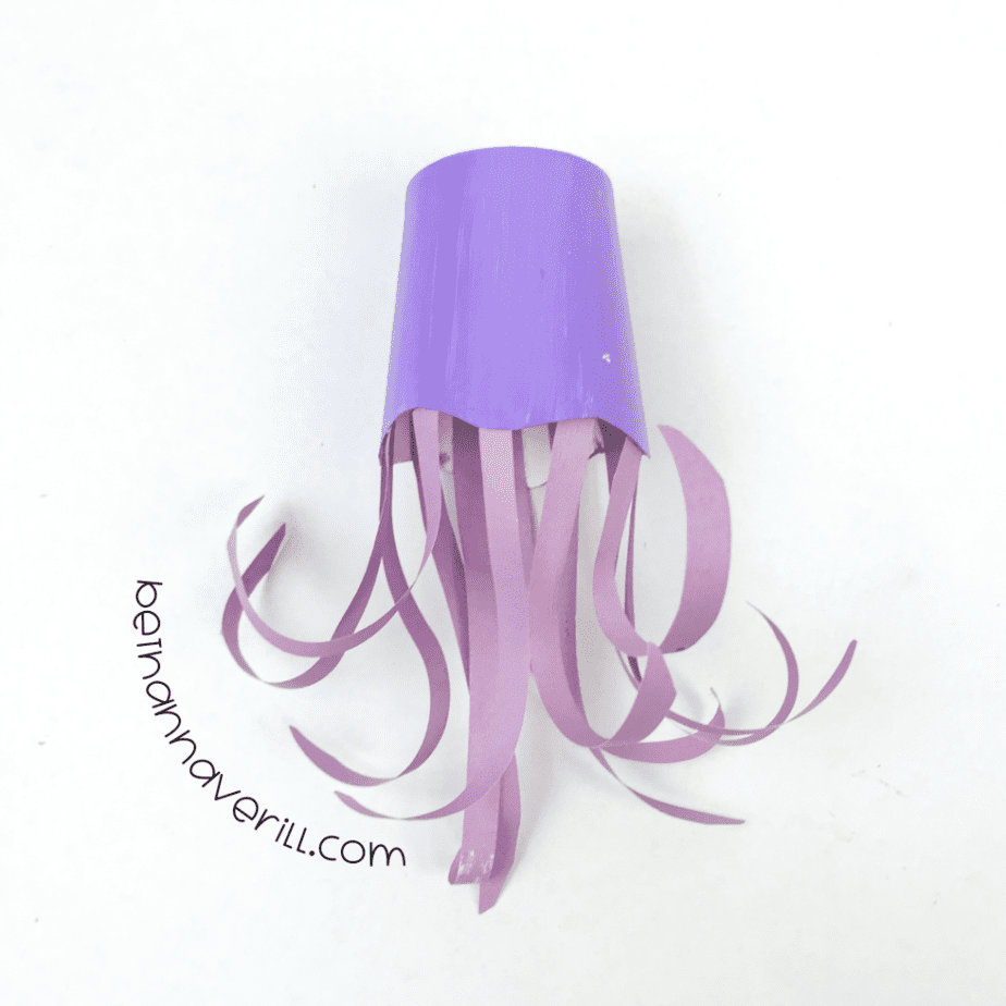 Curled tentacles taped inside the purple cup