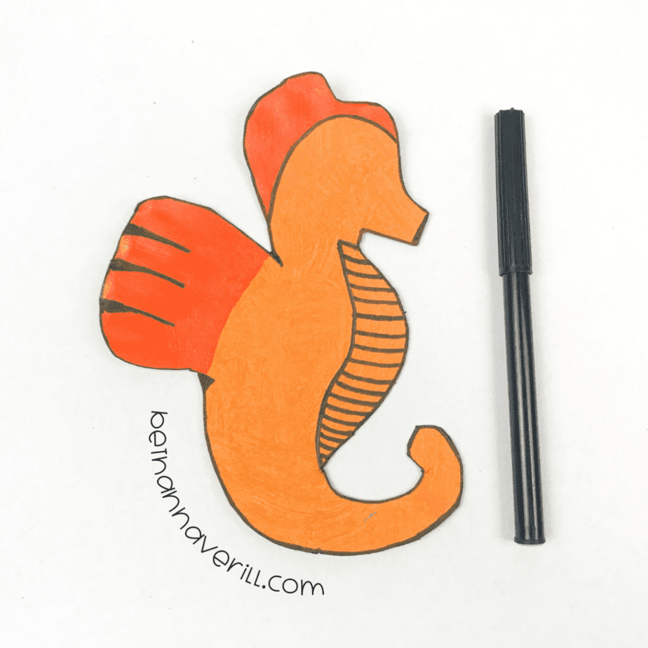 Marker details drawn on the orange seahorse