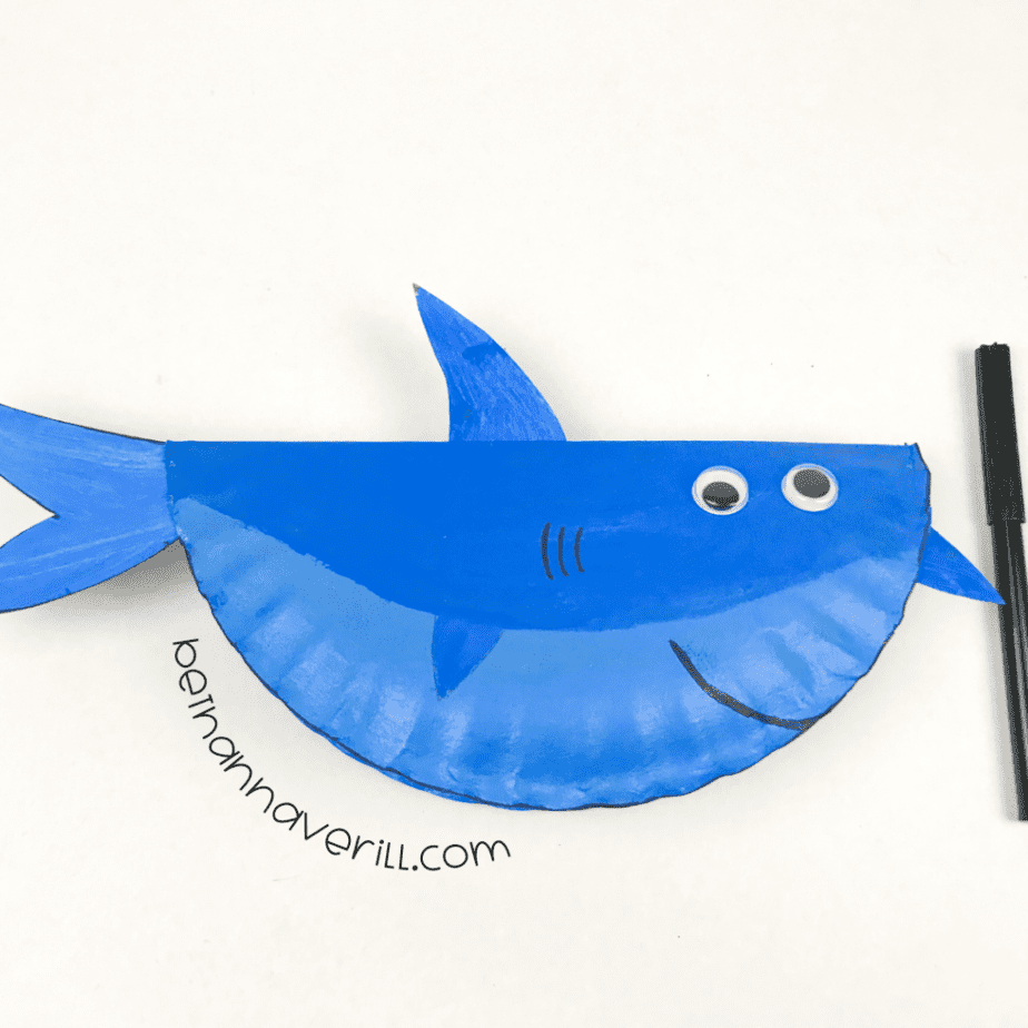 Googly eyes on the paper plate shark