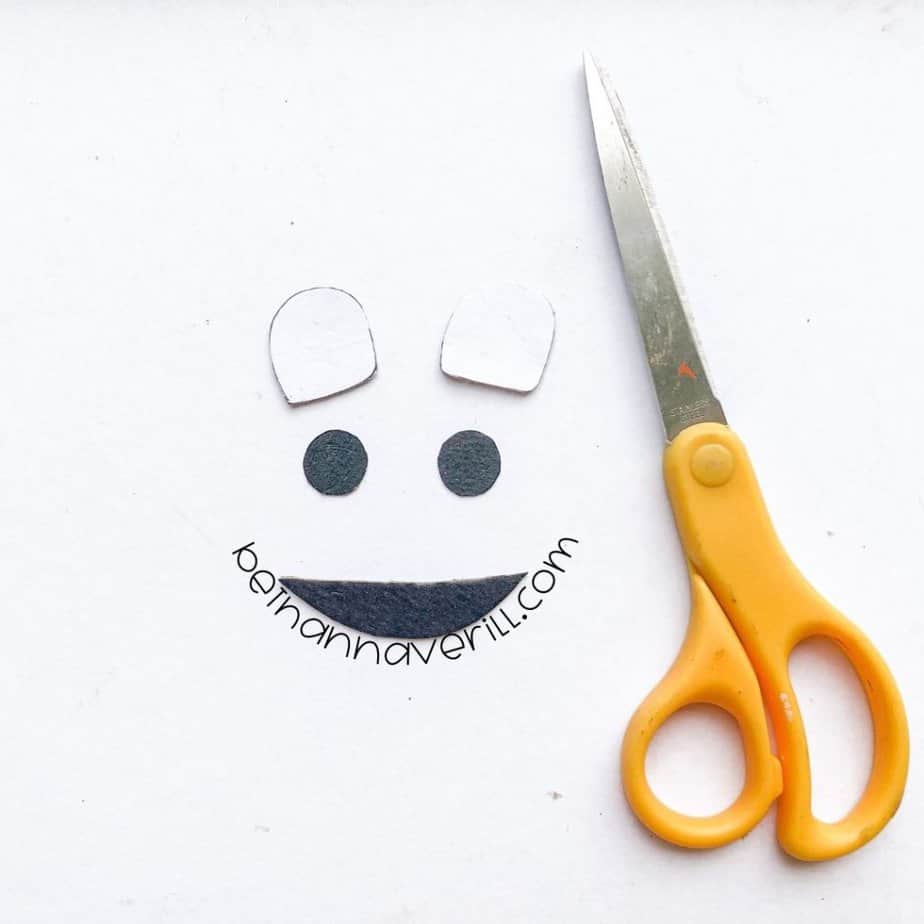White cardstock eyes and a black mouth cut out