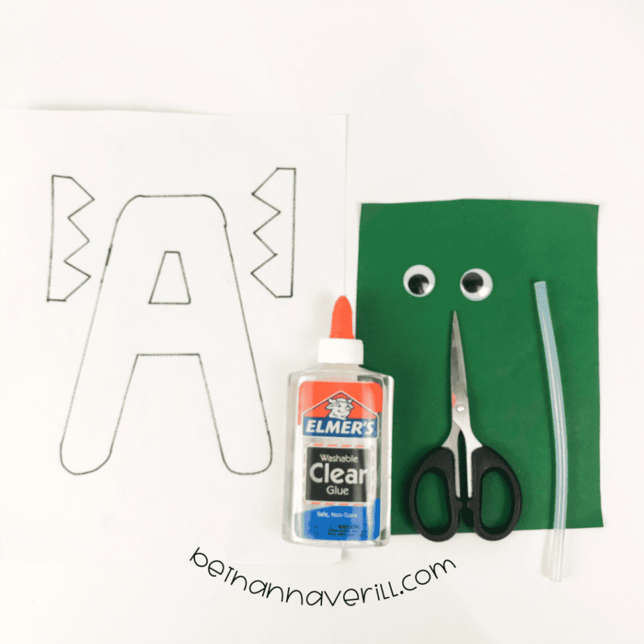 Construction paper, glue, a marker, scissors and the printable A is for Alligator template