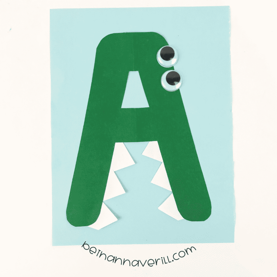 Googly eyes glued to the alligator A