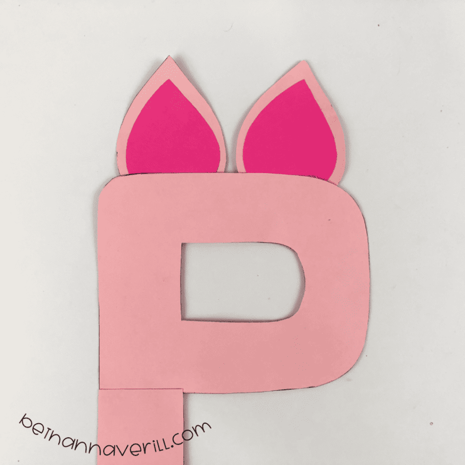 Ears glued behind the top of the pink P