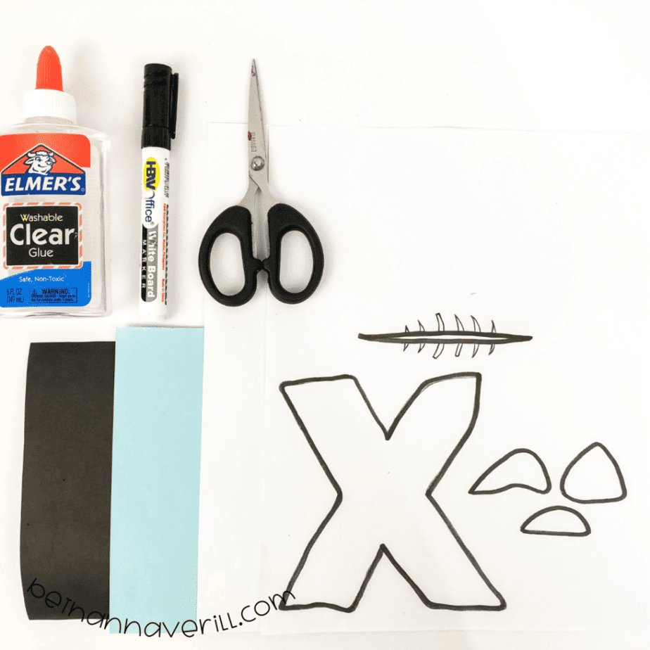 Construction paper, glue, a marker, scissors and the printable X is for X-Ray Fish template