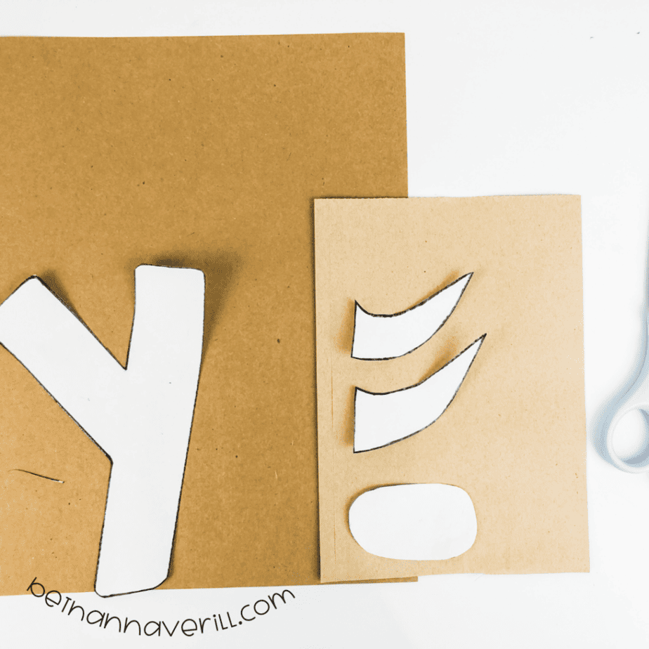 Y template traced onto brown construction and craft paper