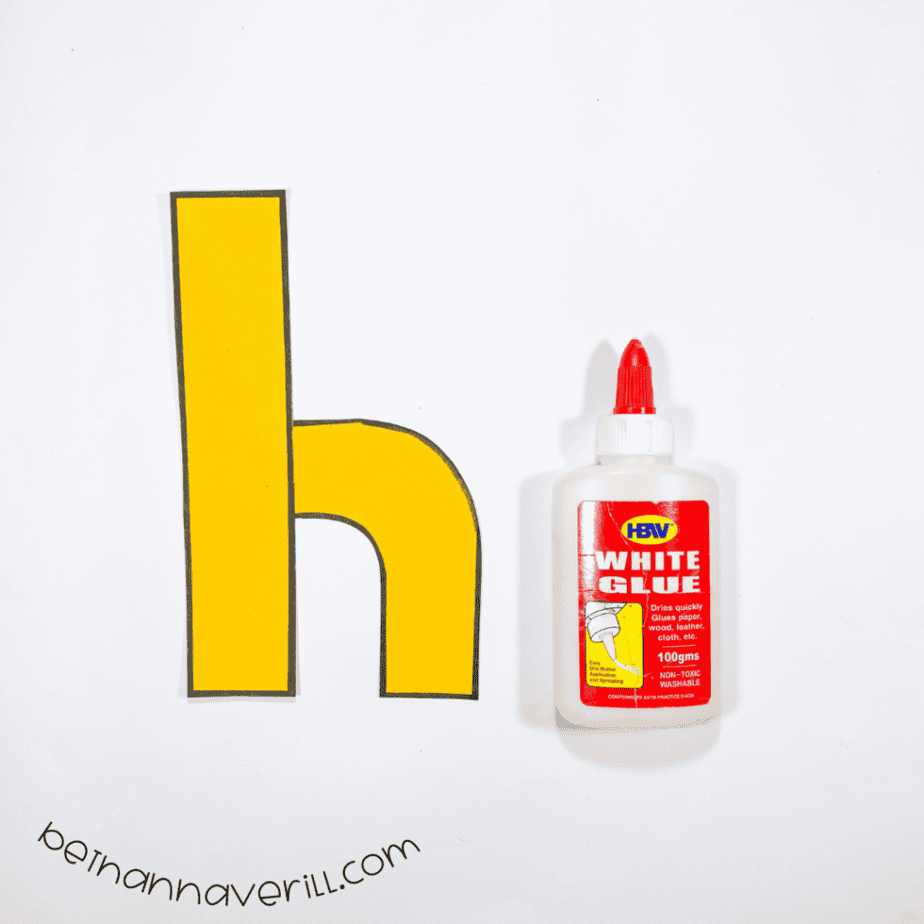 Yellow pieces glued into a lowercase h
