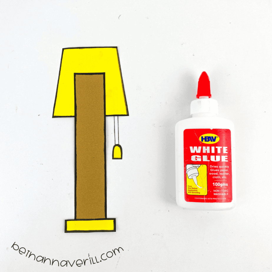 Yellow lampshade and base glued to the brown lowercase l