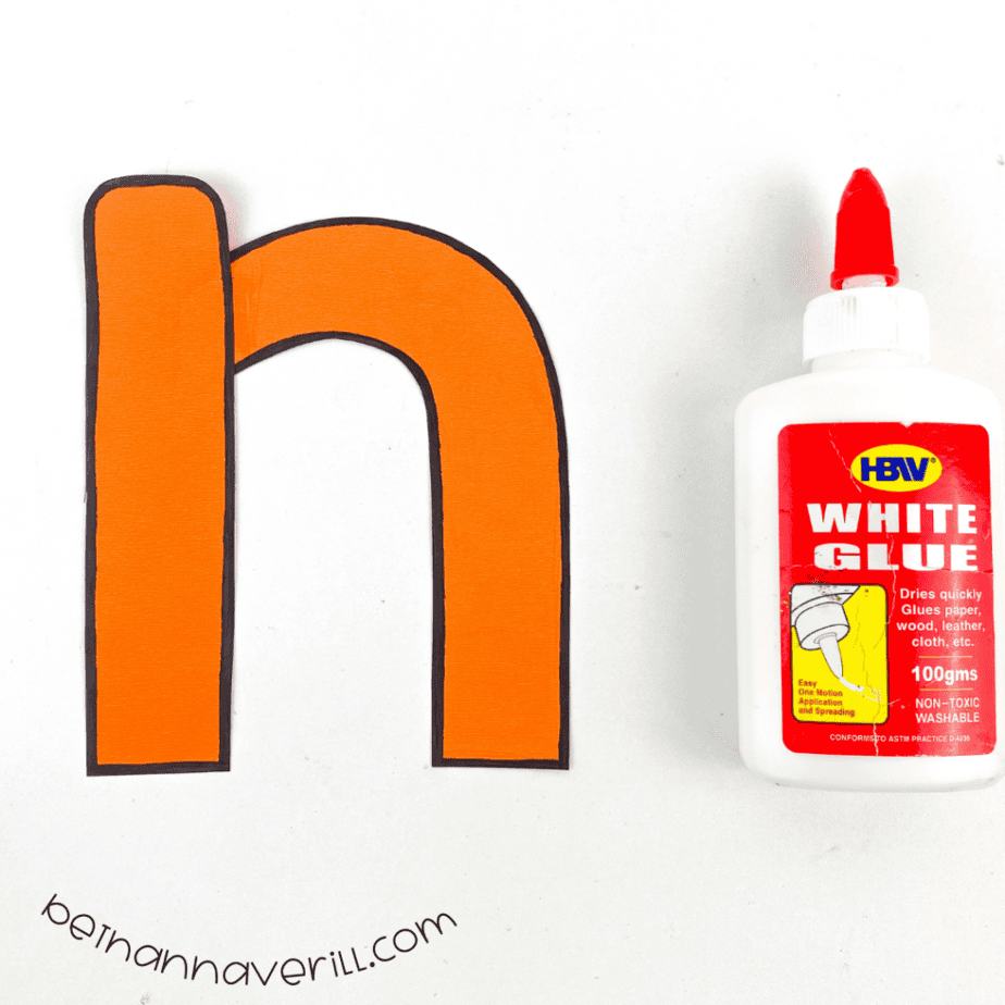 Orange pieces forming a lowercase n