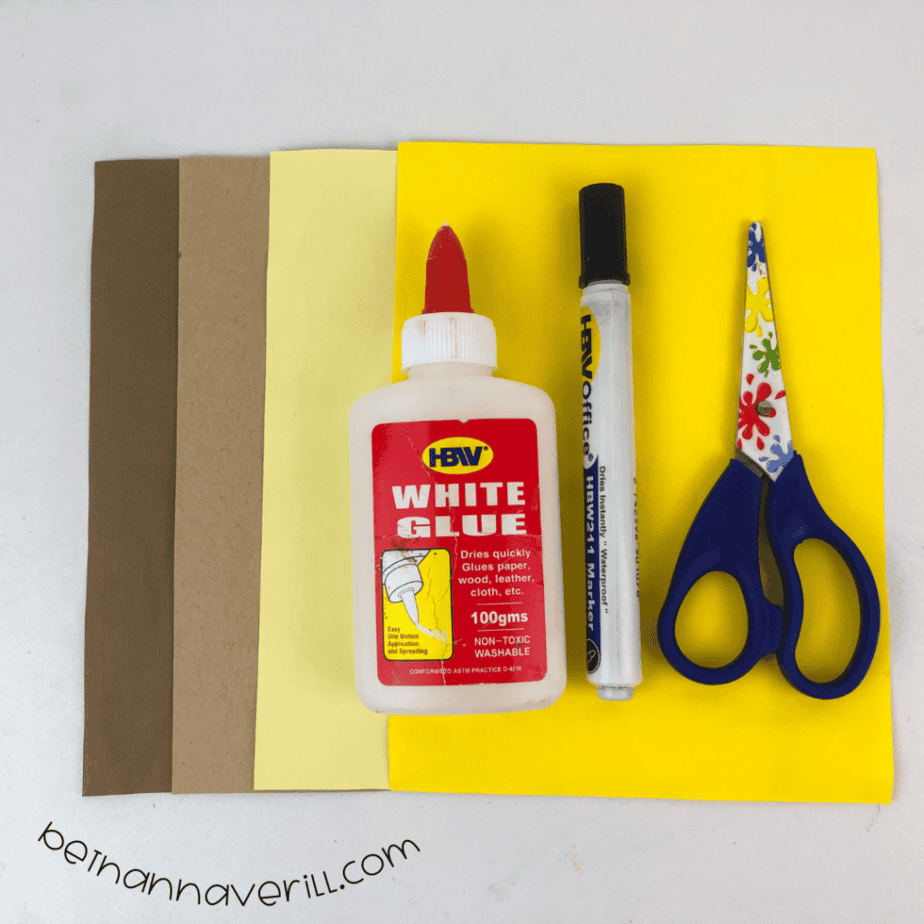Construction paper, glue, a marker, scissors and the printable o is for Owl template