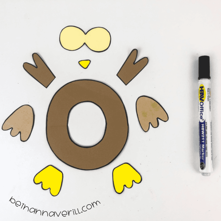Black marker outlines around the o is for Owl paper shapes