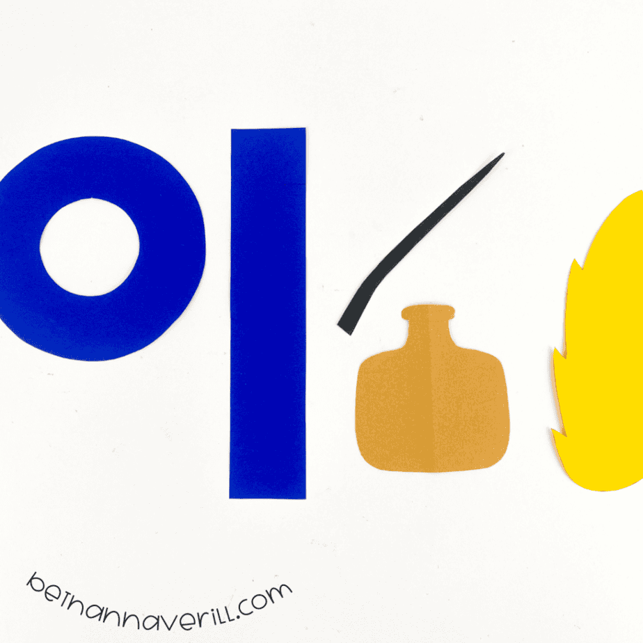 The q is for Quill shapes cut from blue, beige, black and yellow construction paper