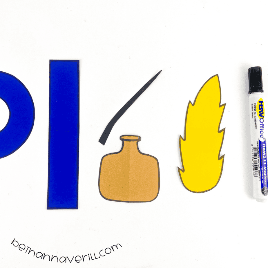 Black marker outlines around the q is for Quill paper shapes