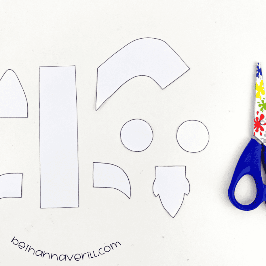 Rocket template pieces cut out next to scissors