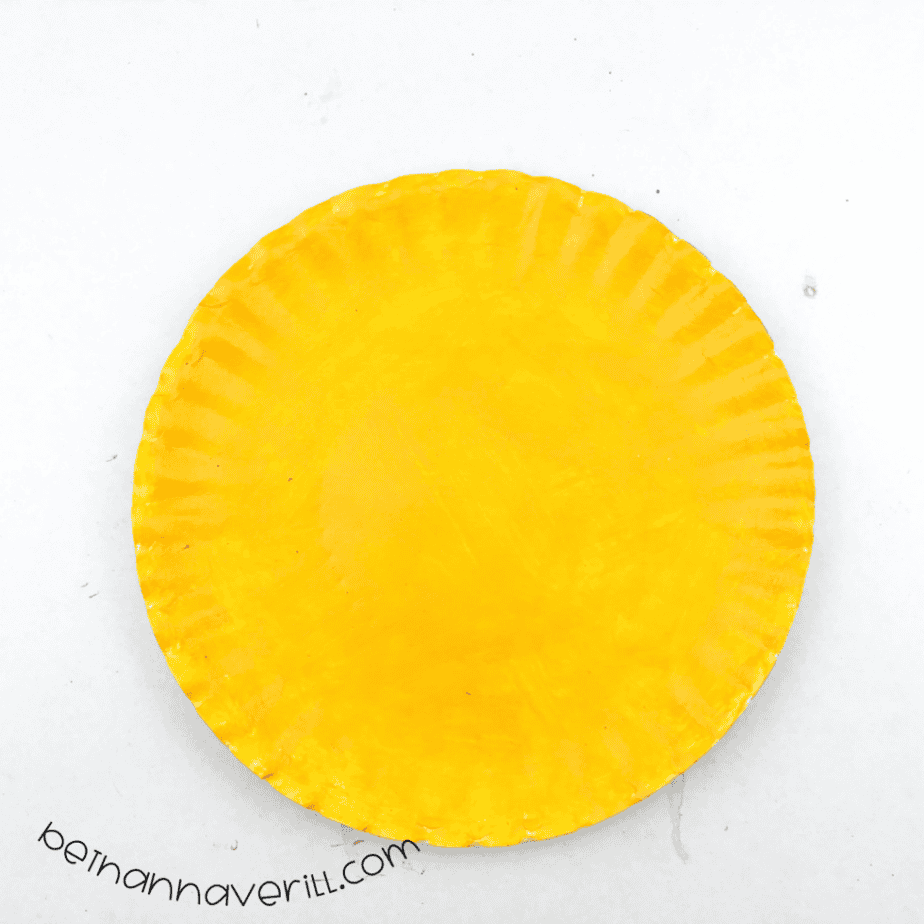 Paper plate painted lemon yellow