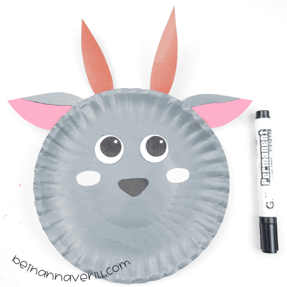 Goat paper plate with ears and horns attached next to a marker