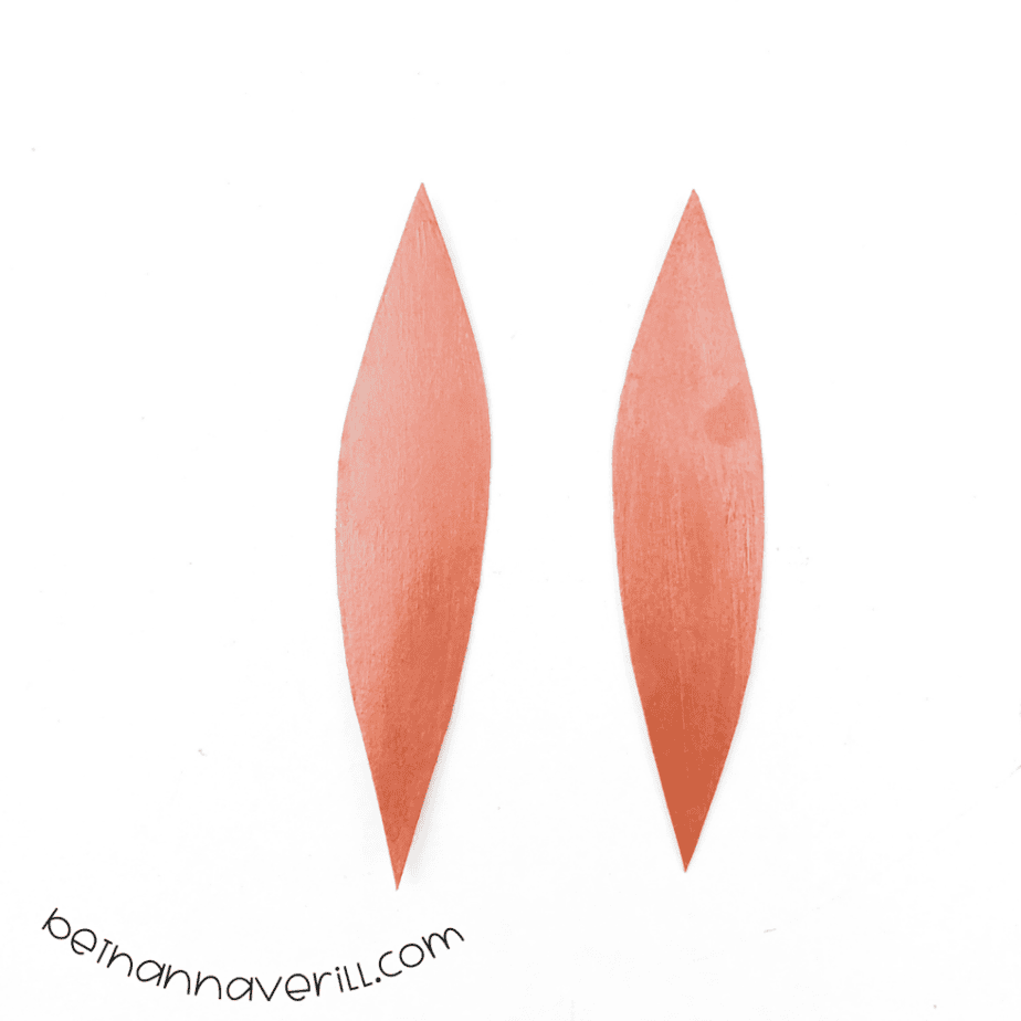 Two goat horns painted brown