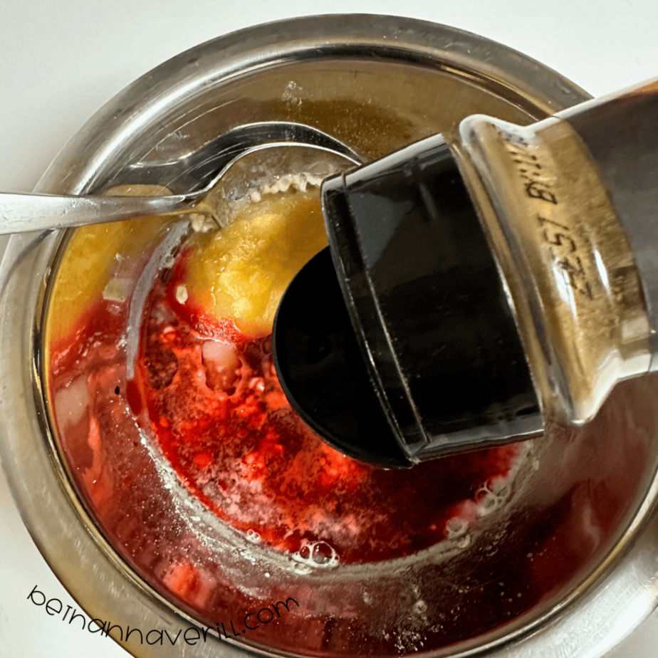 Ground cinnamon shaken into the red playdough mixture