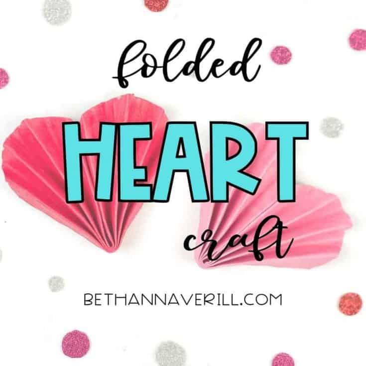 Two folded paper hearts in red and pink with text overlay 'Folded Heart Craft' on a white background decorated with glittery confetti dots.