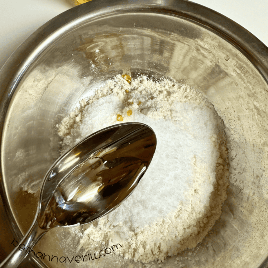 Spoonful of vegetable oil added to the flour and salt