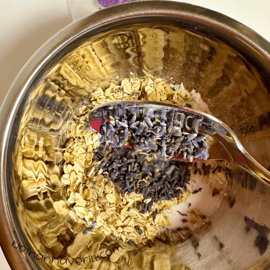 Spoonful of dried lavender flowers added to the oatmeal playdough mixture