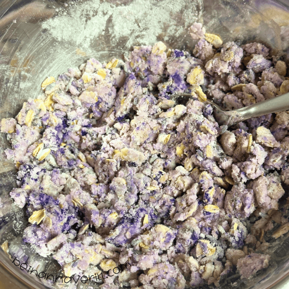 Purple lavender oatmeal playdough mixed together in a metal bowl