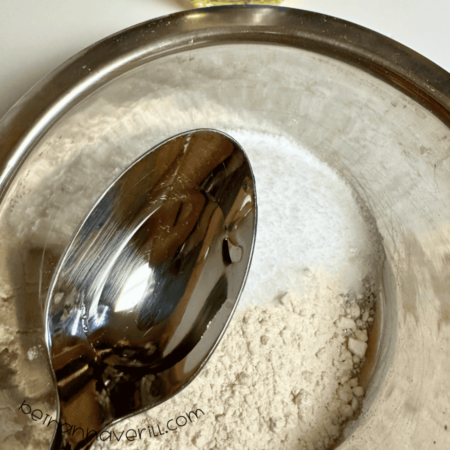 Spoonful of vegetable oil added to the flour and salt mixture