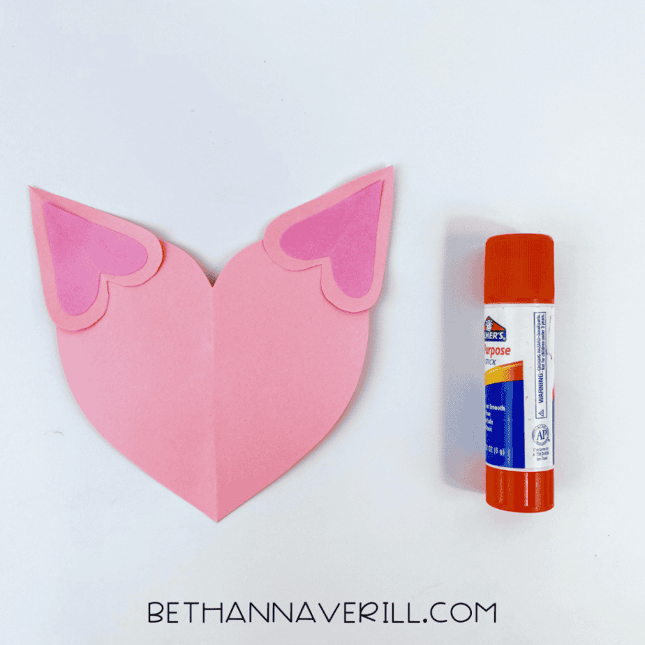 Heart ears glued to the top of the cat face