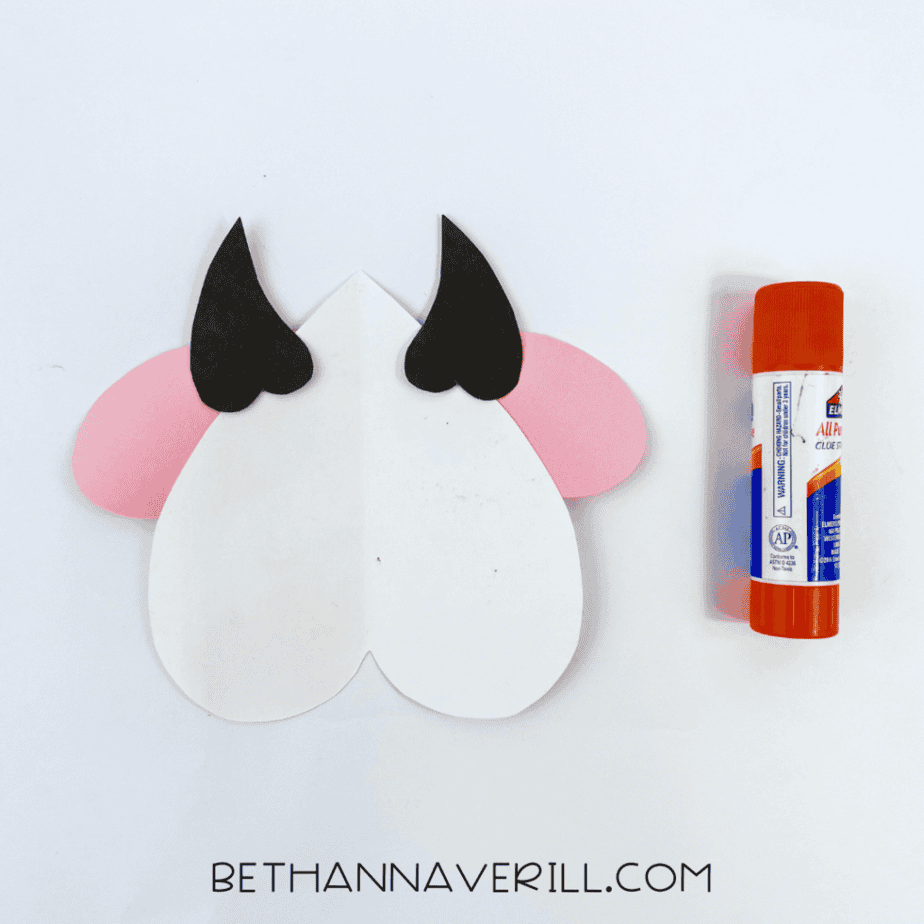 Horns and ears glued to the top of the white heart