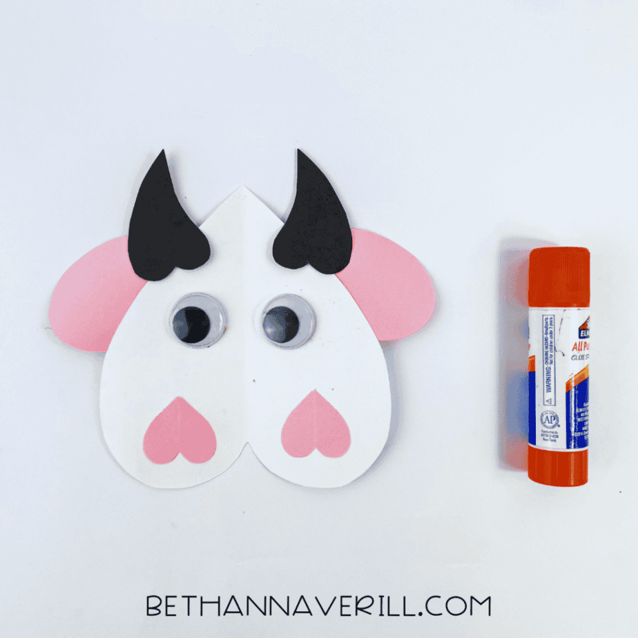 Googly eyes added to the heart cow