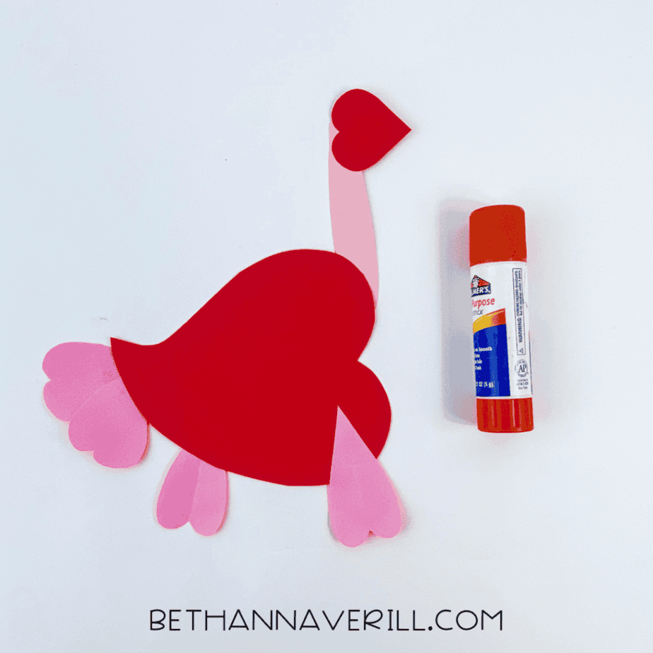 Pink heart feathers glued onto the ostrich