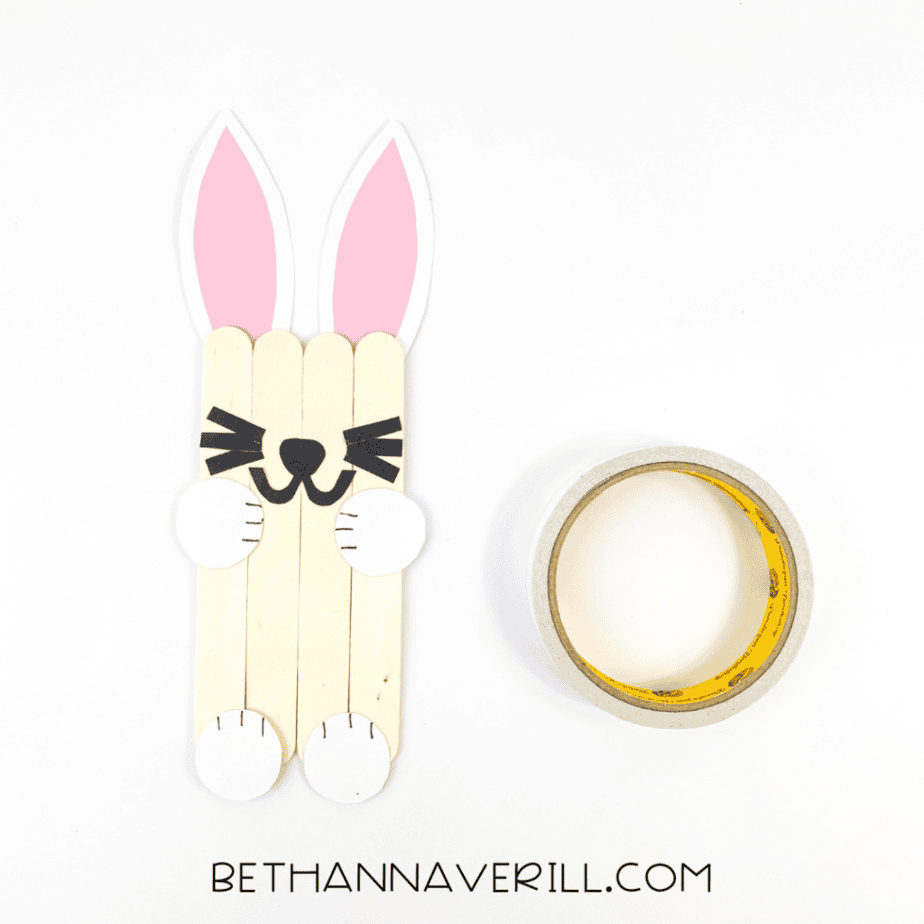 Bunny face pieces glued onto the popsicle sticks