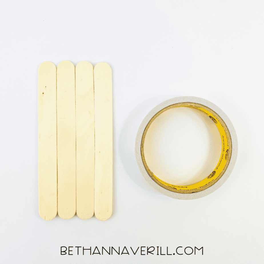 Four popsicle sticks taped together