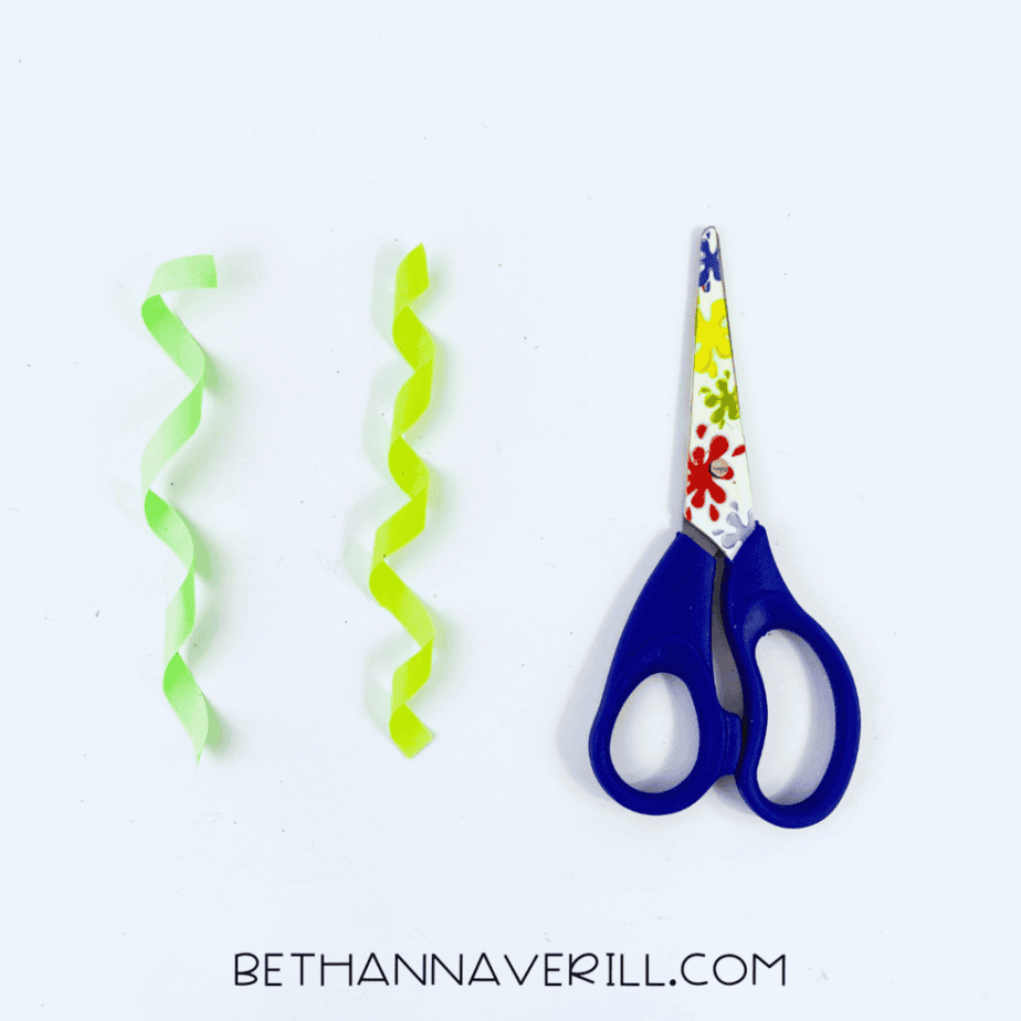 Green ribbons curled with scissors