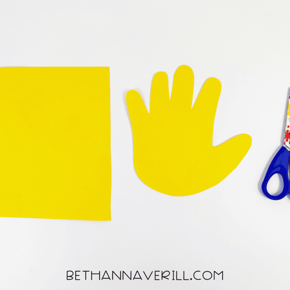 Yellow paper handprint cut out