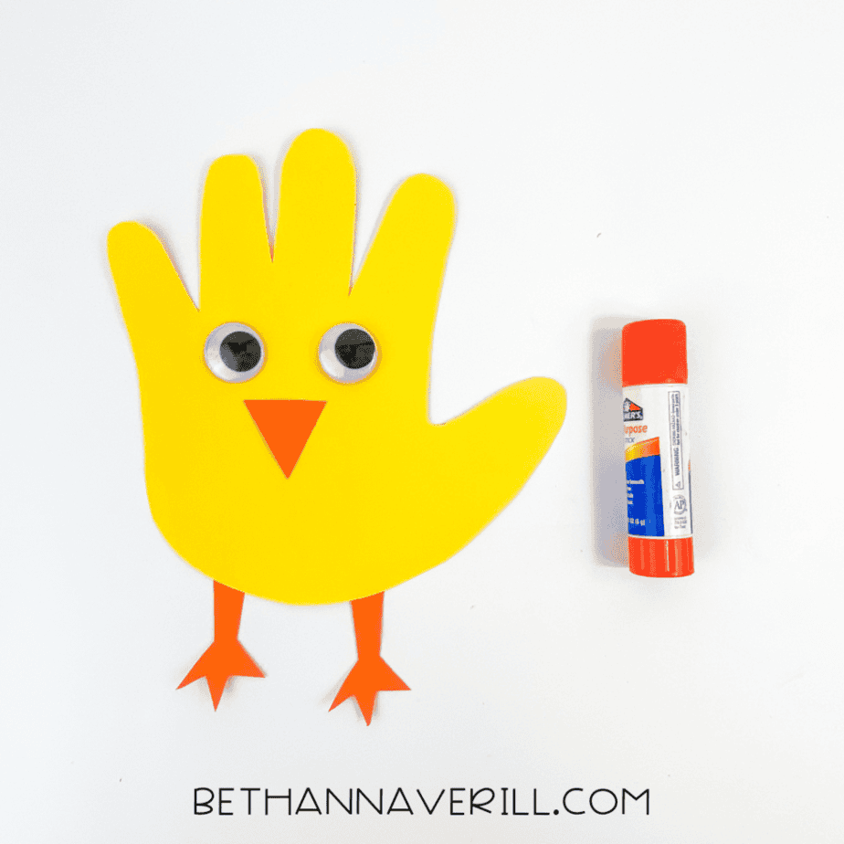Googly eyes added to the handprint chick