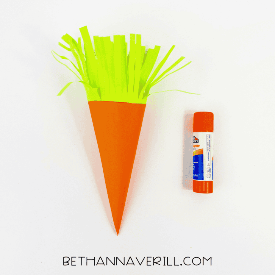 Green top glued into the orange paper carrot