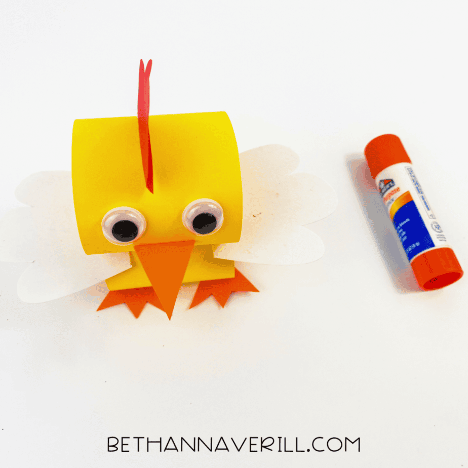 Googly eyes added to the paper chick