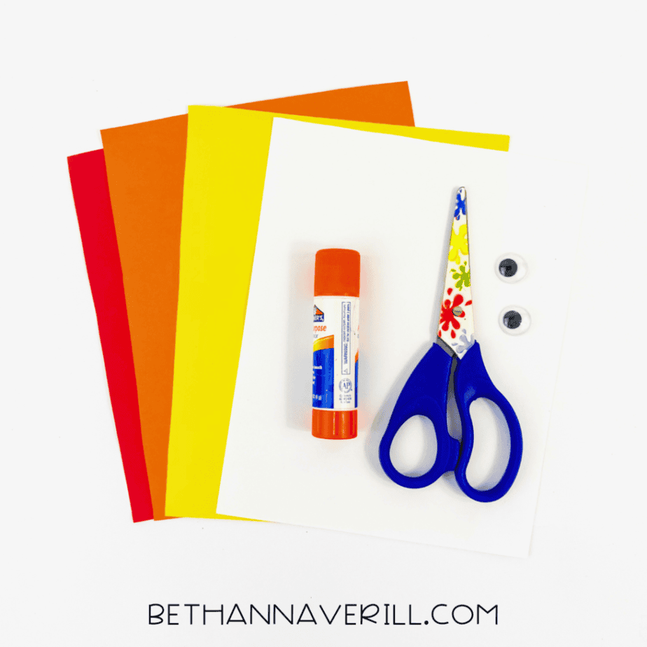 Paper chick supplies: yellow, white, red and orange paper, googly eyes, glue stick and scissors
