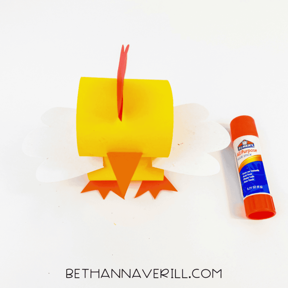 Comb, beak and feet glued onto the paper chick