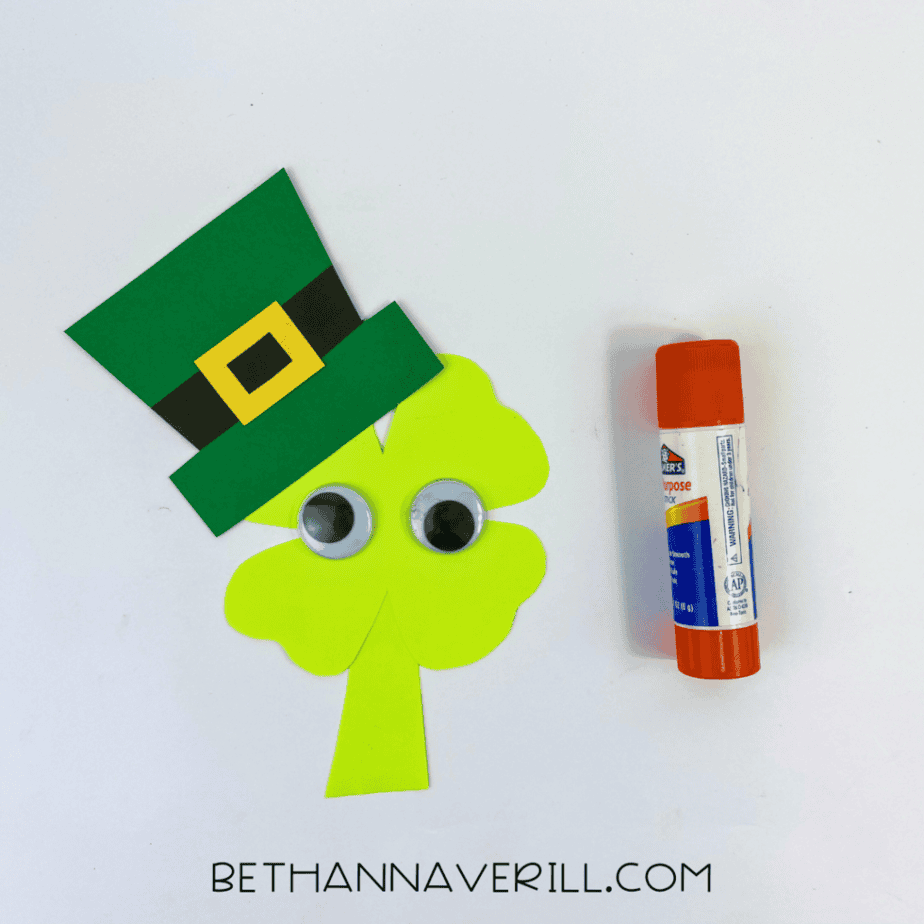 Googly eyes glued onto the shamrock