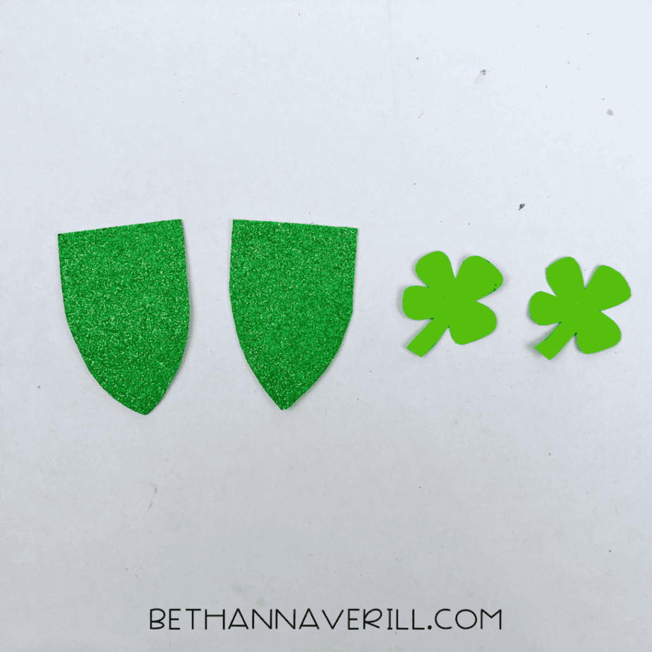 Sparkly green banners and light green shamrocks cut out