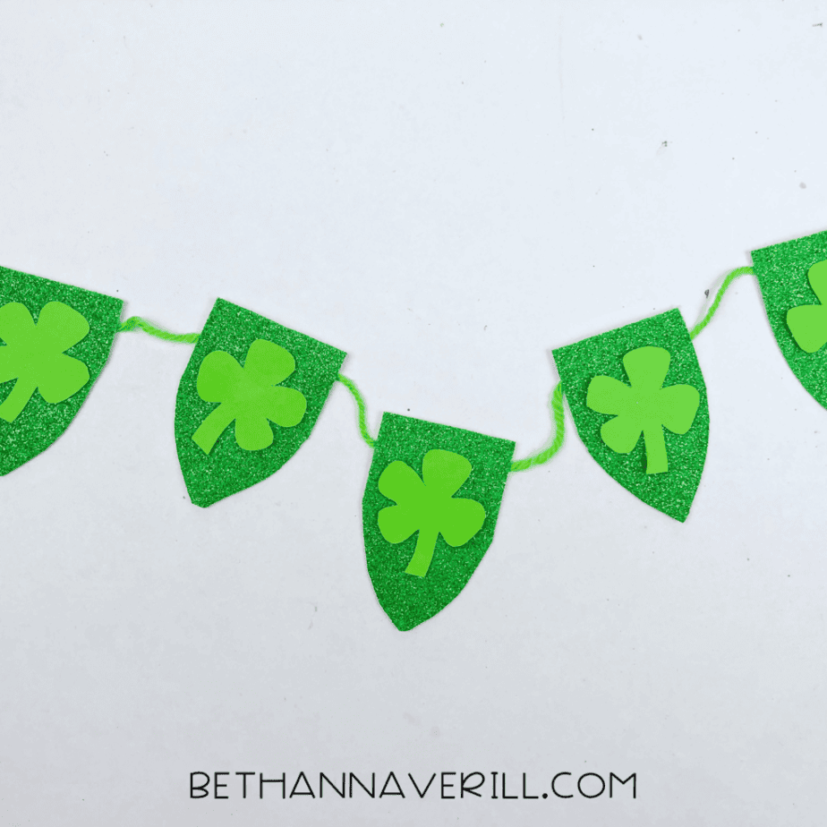 Finished shamrock garland strung on green yarn
