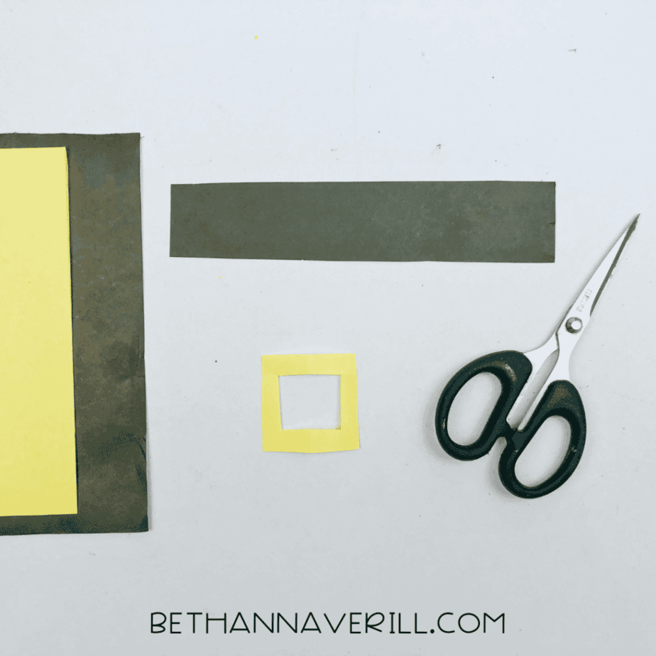 Black paper band and yellow buckle cut out