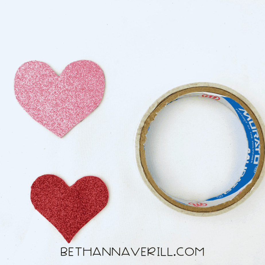 Pink and red sparkly paper hearts