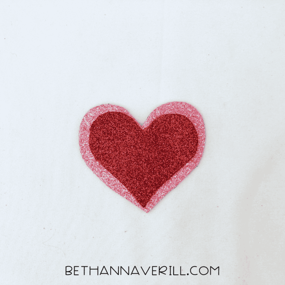 Red heart glued on top of the pink heart