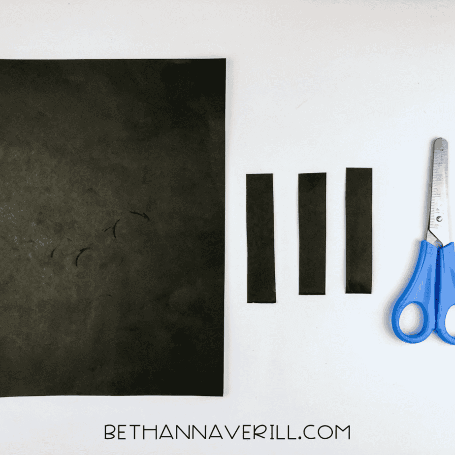 Black paper stripes cut out