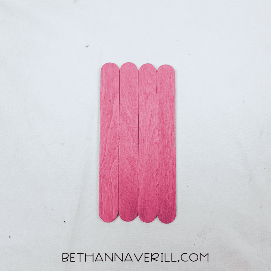 Craft stick body painted pink