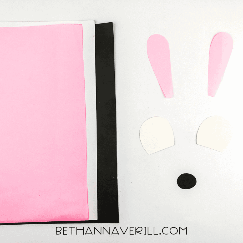 Pieces of pink, black, and white paper cut for the kangaroo’s inner ears, eyes, and nose
