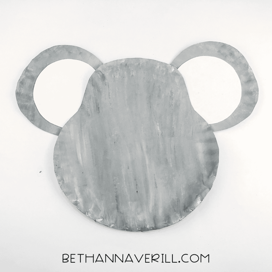 Ears glued to the back of the gray koala head plate to form the full koala face shape.